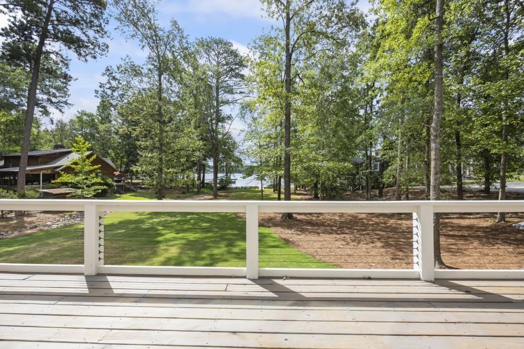 1301 Grayson Pointe Drive Buckhead, GA 30625 - Photo 18 of 56 a view of a living room and trees
