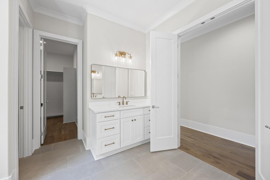 1301 Grayson Pointe Drive Buckhead, GA 30625 - Photo 25 of 56 a spacious bathroom with a double vanity sink and a mirror