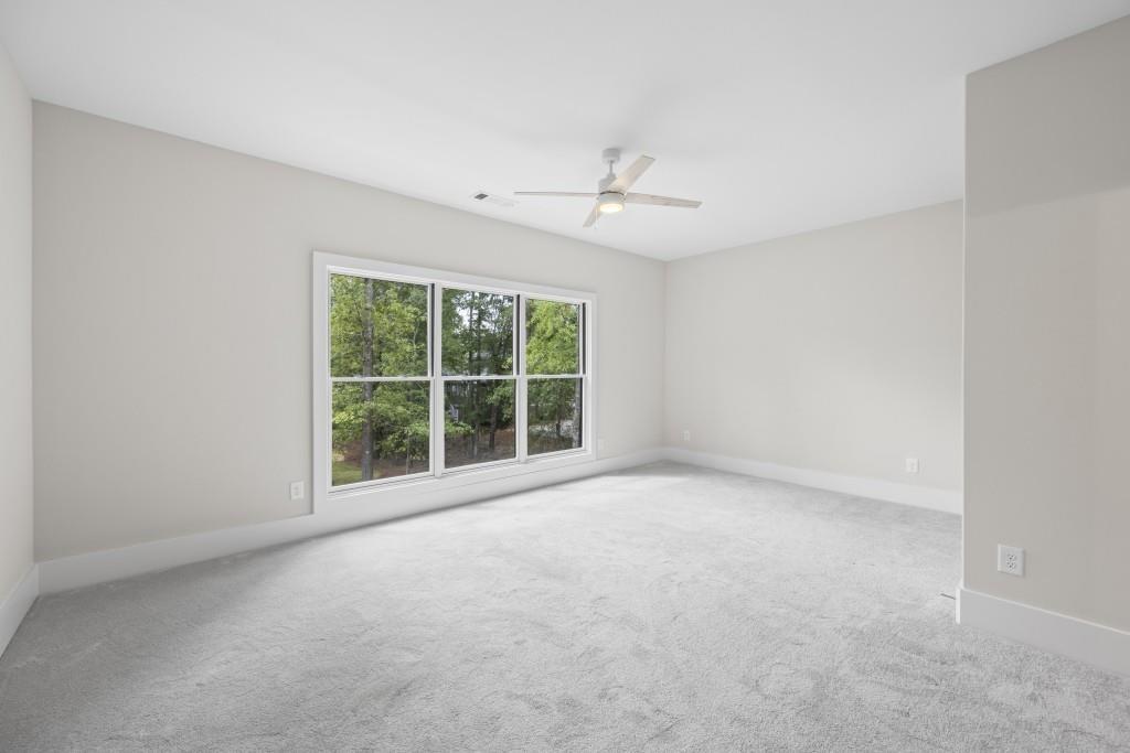1301 Grayson Pointe Drive Buckhead, GA 30625 - Photo 38 of 56 a view of an empty room with a window