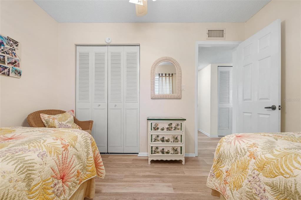 9527 Azure Cove Bradenton, FL 34210 - Photo 24 of 49 a bedroom with a bed and a window