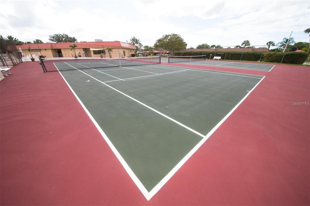 9527 Azure Cove Bradenton, FL 34210 - Photo 40 of 49 a view of a tennis court