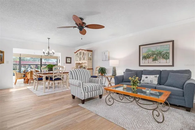 a living room with furniture and a table