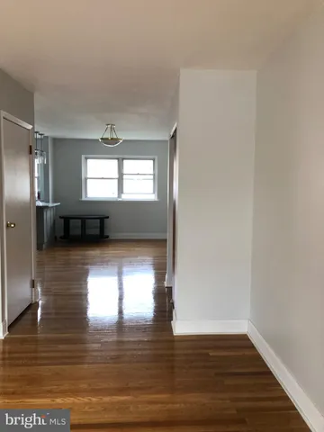a view of a livingroom with wooden floor