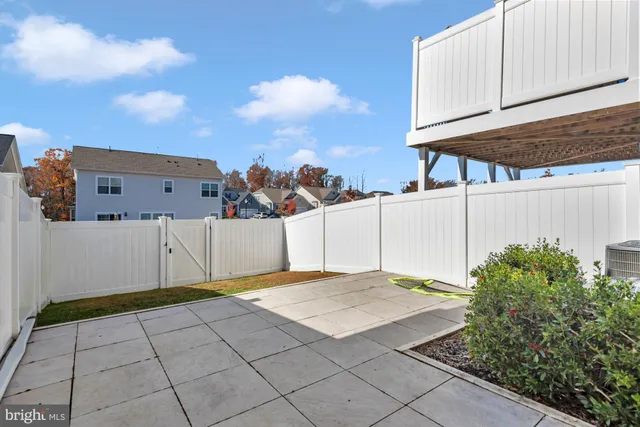 a view of a backyard of the house