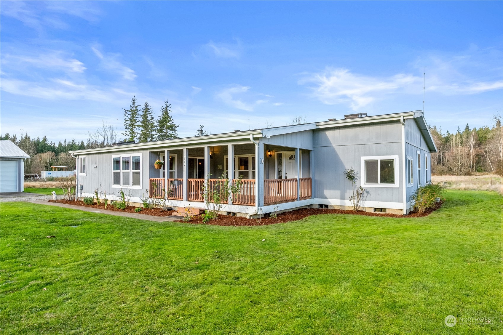 3002 Creasey Road Custer, WA 98240 - Photo 6 of 40 a view of a house with a yard and sitting area