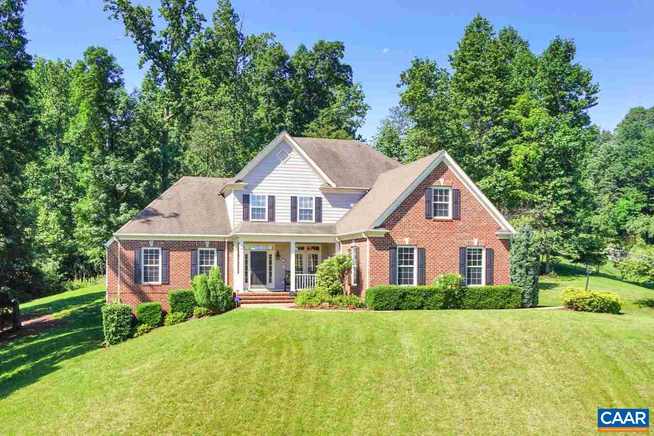 1915 Ridgetop Drive Charlottesville, VA 22903 - Photo 1 of 35 a front view of a house with a yard