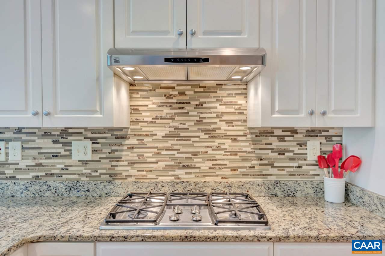 1915 Ridgetop Drive Charlottesville, VA 22903 - Photo 15 of 35 a kitchen with a sink and cabinets