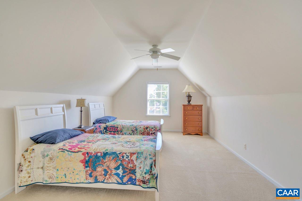 1915 Ridgetop Drive Charlottesville, VA 22903 - Photo 28 of 35 a bedroom with a bed and a window