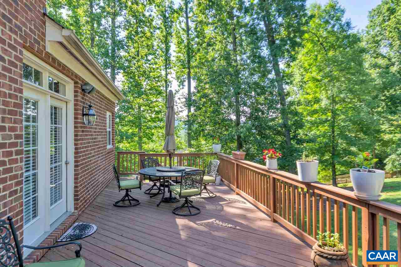 1915 Ridgetop Drive Charlottesville, VA 22903 - Photo 31 of 35 a view of balcony with chairs and wooden fence