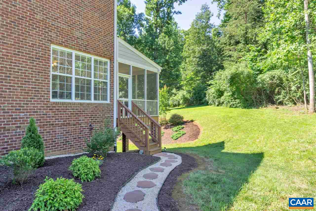 1915 Ridgetop Drive Charlottesville, VA 22903 - Photo 34 of 35 a view of a backyard with plants and a garden