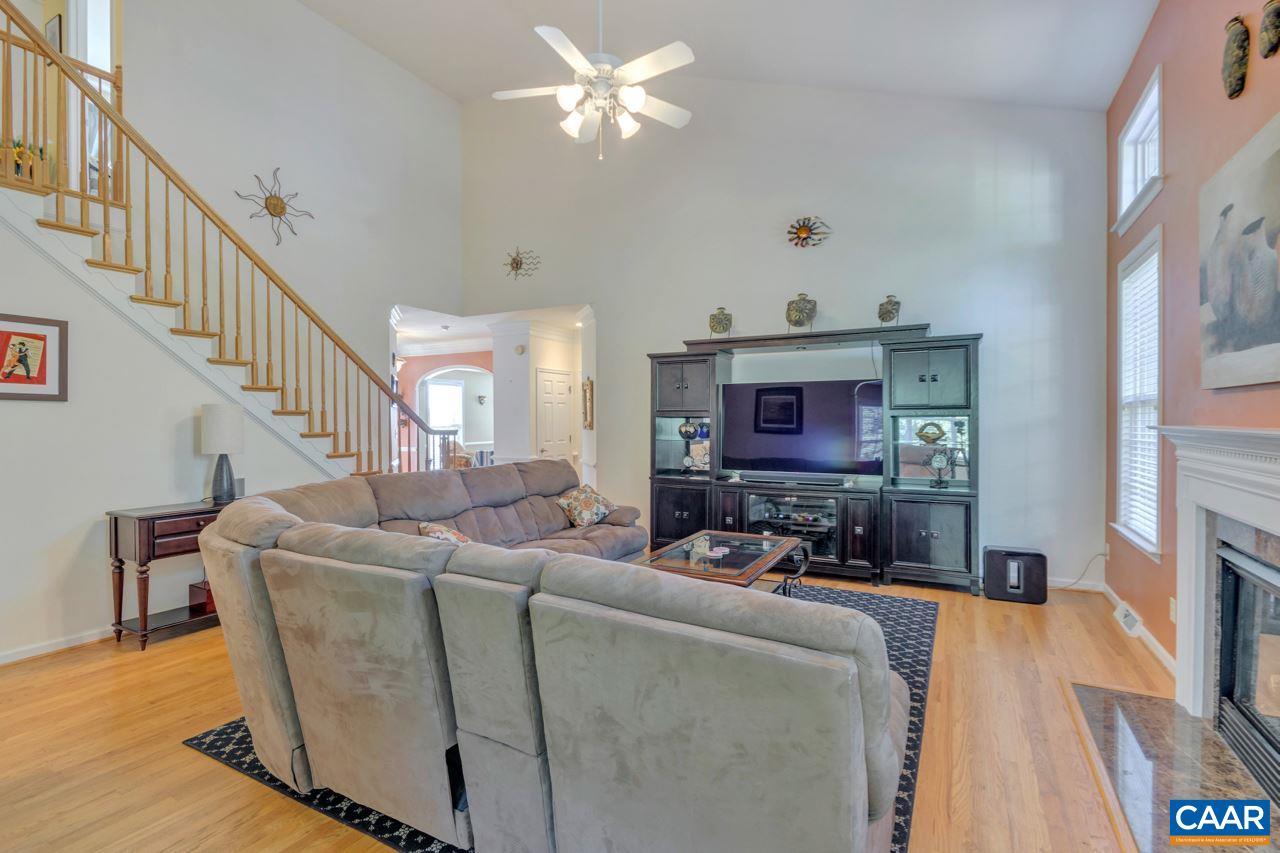 1915 Ridgetop Drive Charlottesville, VA 22903 - Photo 9 of 35 a living room with furniture and a fireplace
