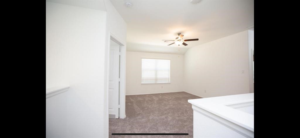 19044 Pinewood Grove Trail New Caney, TX 77357 - Photo 15 of 24 a bathroom with a sink vanity and a mirror