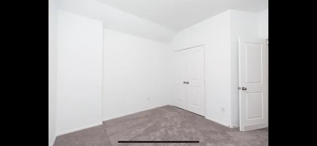 a view of a livingroom with a ceiling fan