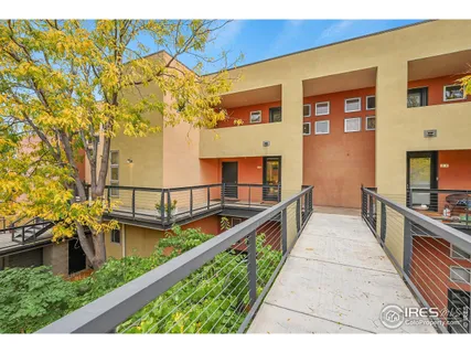 a view of swimming pool with seating space