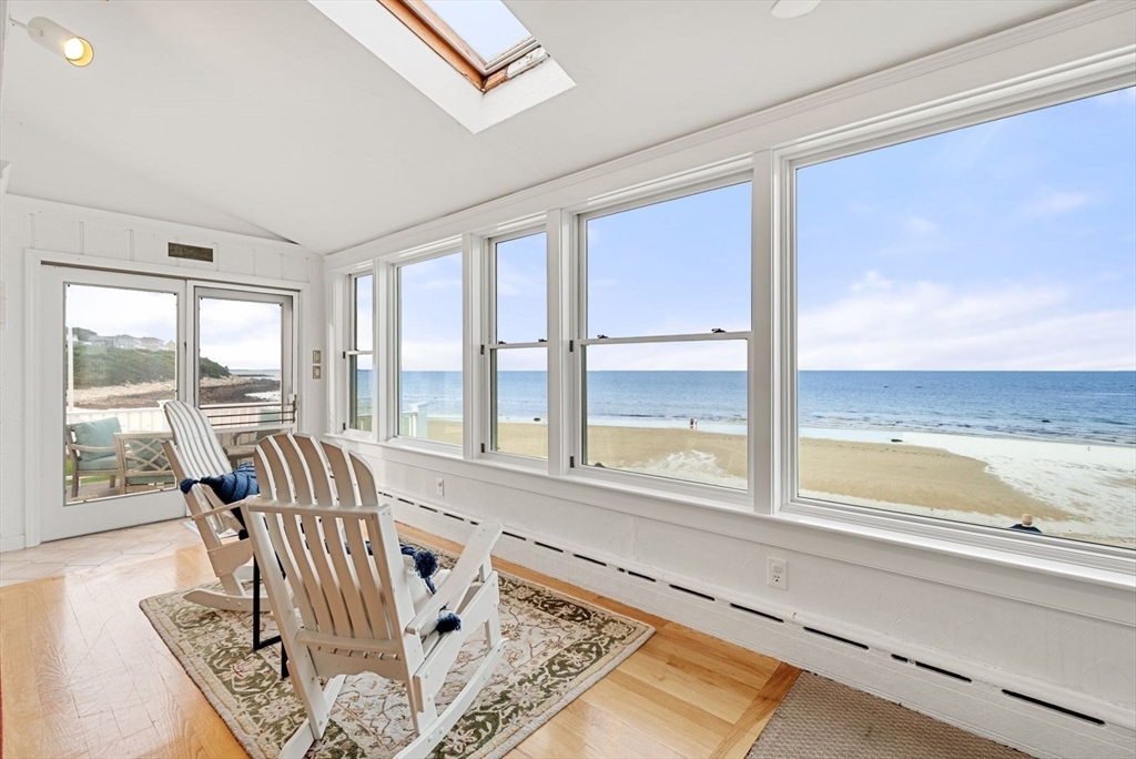 4 Priscilla Beach Road Plymouth, MA 02360 - Photo 11 of 34 a living room with furniture and floor to ceiling windows