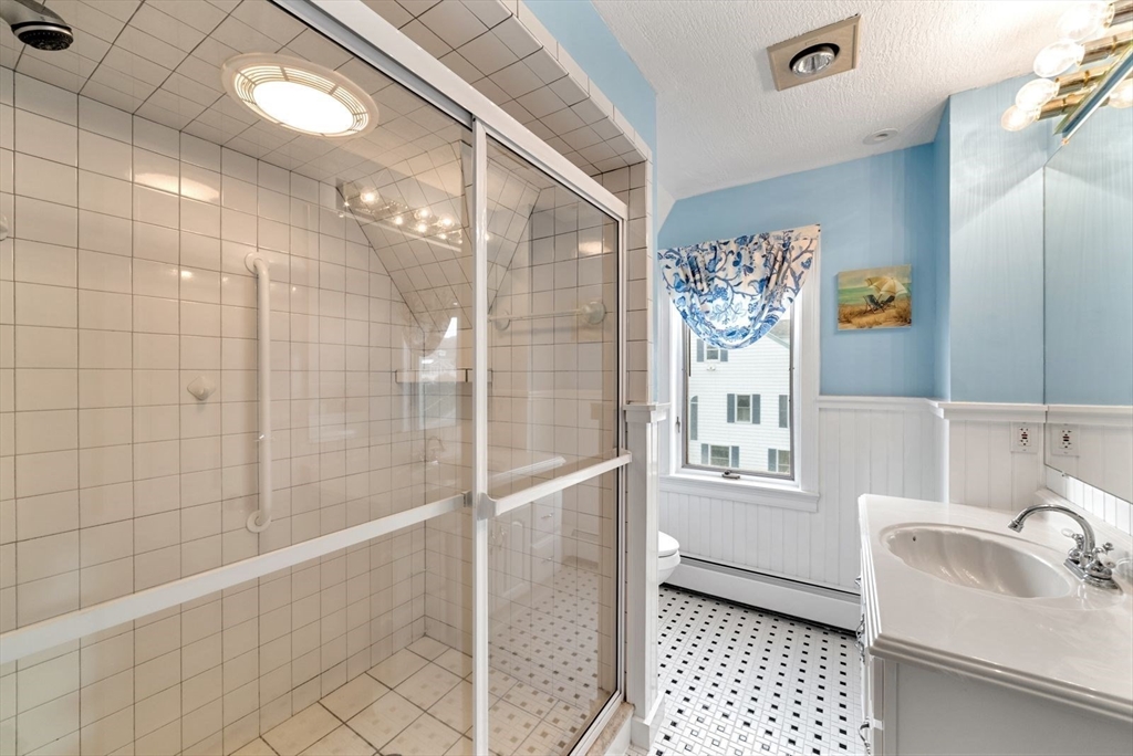 4 Priscilla Beach Road Plymouth, MA 02360 - Photo 22 of 34 a bathroom with a sink toilet and shower