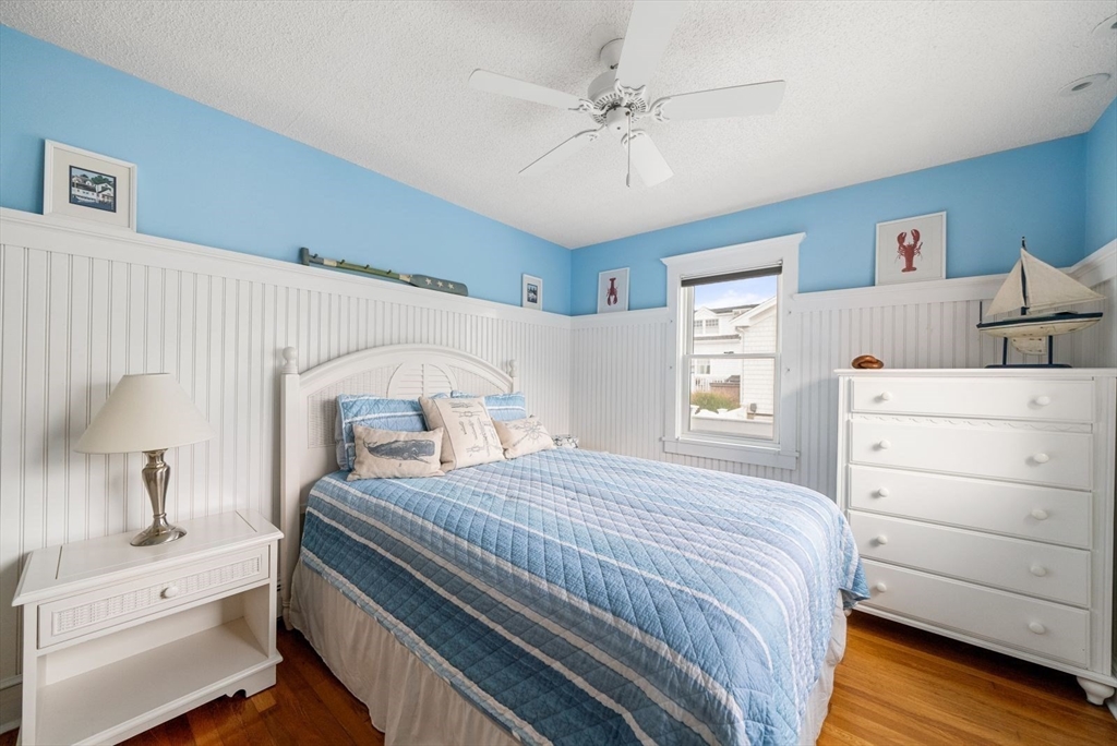 4 Priscilla Beach Road Plymouth, MA 02360 - Photo 25 of 34 a bedroom with a bed and a dresser