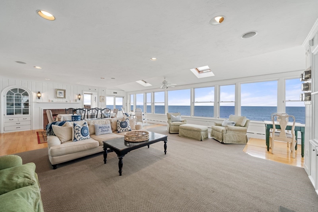 4 Priscilla Beach Road Plymouth, MA 02360 - Photo 10 of 34 a living room with furniture and view of kitchen