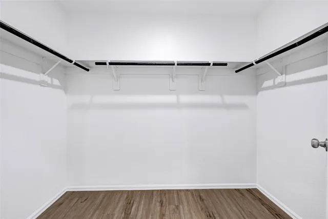 a view of an empty walk in closet