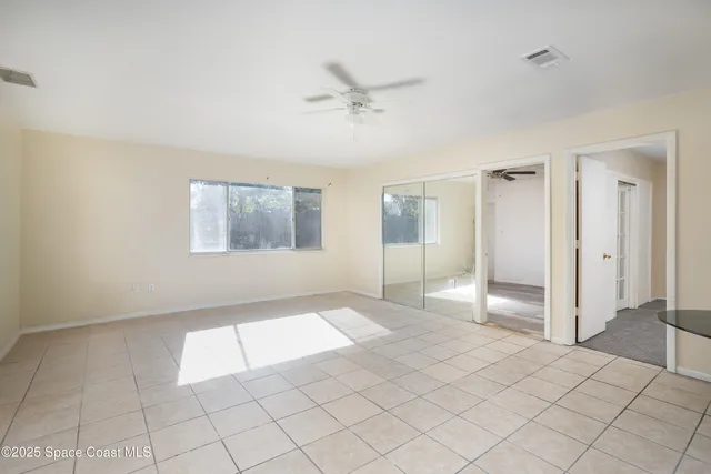 a view of an empty room and window