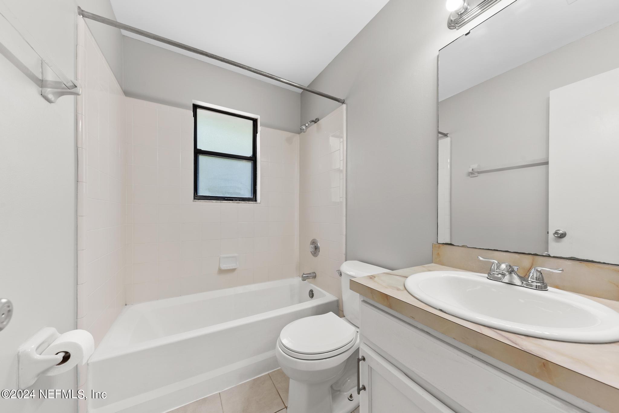 3604 Morton Street, Unit 2 Jacksonville, FL 32217 - Photo 13 of 22 a bathroom with a sink a toilet and a bathtub