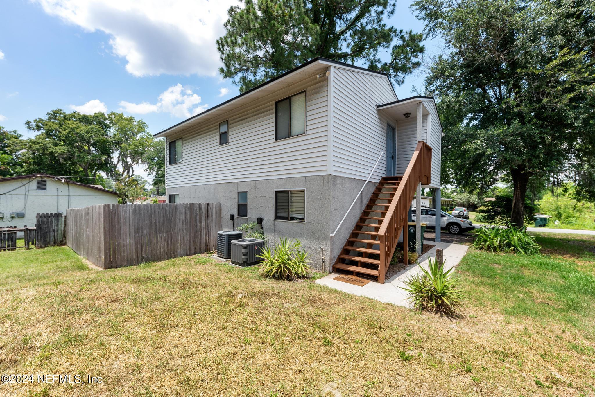 3604 Morton Street, Unit 2 Jacksonville, FL 32217 - Photo 2 of 22 a front view of a house with a yard