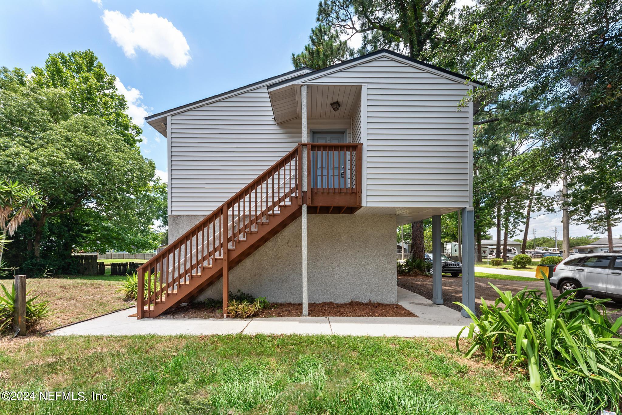 3604 Morton Street, Unit 2 Jacksonville, FL 32217 - Photo 22 of 22 a view of a house with a yard