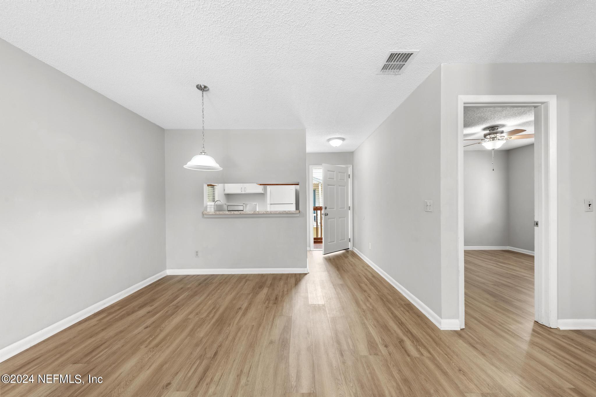 3604 Morton Street, Unit 2 Jacksonville, FL 32217 - Photo 8 of 22 a view of empty room with wooden floor