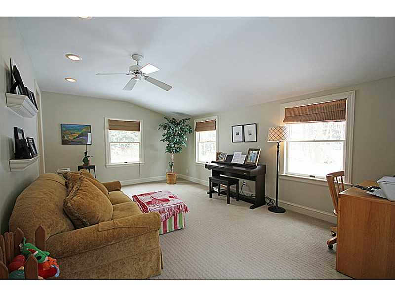 19 Surrey Road Barrington, RI 02806 - Photo 12 of 24 Den/Family/Great Room. This large family/great room features Berber carpet and recessed lighting.