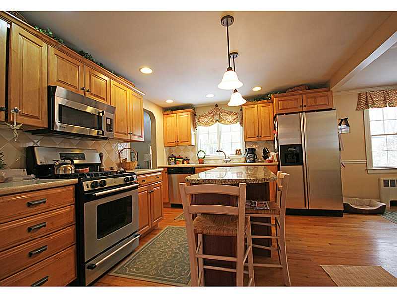 19 Surrey Road Barrington, RI 02806 - Photo 3 of 24 Kitchen. Enjoy cooking with gas in this beautifully renovated kitchen complete with center island,