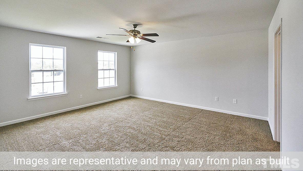278 Water Wheel Road Rocky Mount, NC 27803 - Photo 11 of 20 a view of an empty room with a window