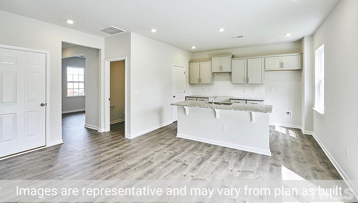 278 Water Wheel Road Rocky Mount, NC 27803 - Photo 5 of 20 a view of kitchen with wooden floor