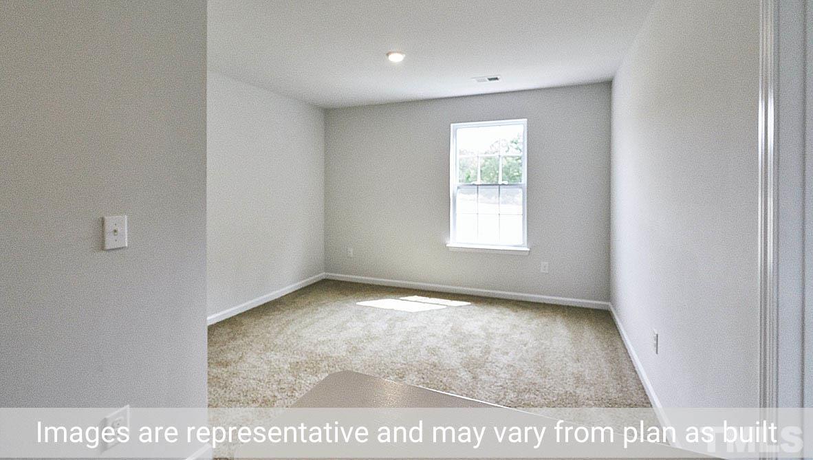 278 Water Wheel Road Rocky Mount, NC 27803 - Photo 7 of 20 a view of an empty room and window