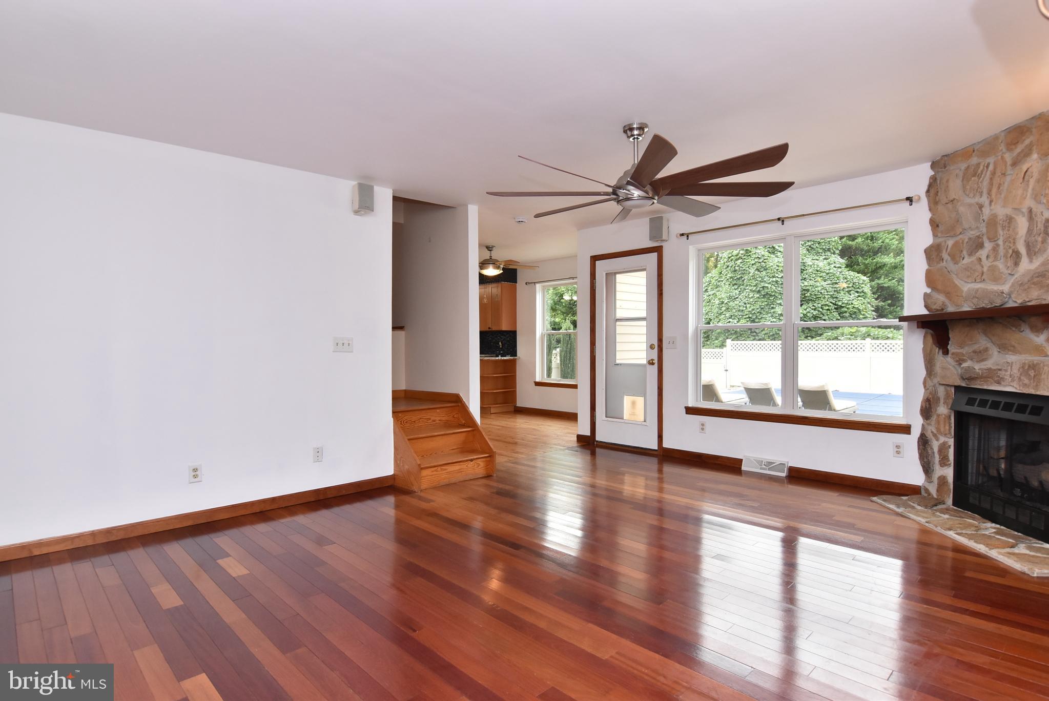 330 Behringer Avenue Milton, DE 19968 - Photo 27 of 49 Living Room with View of Bonus Room Stairs