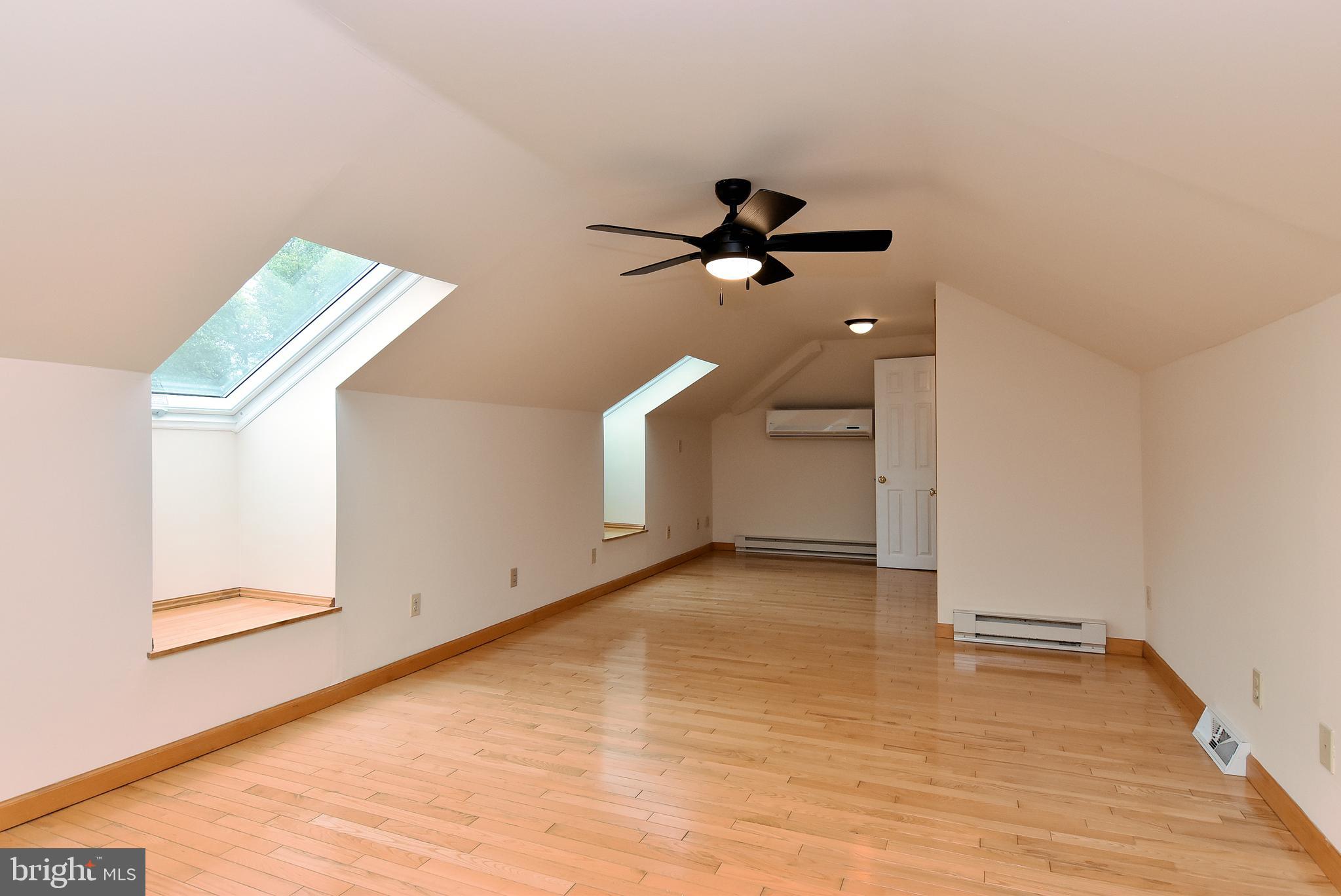 330 Behringer Avenue Milton, DE 19968 - Photo 41 of 49 Upstairs Bonus Room with Emergency Escape Windows