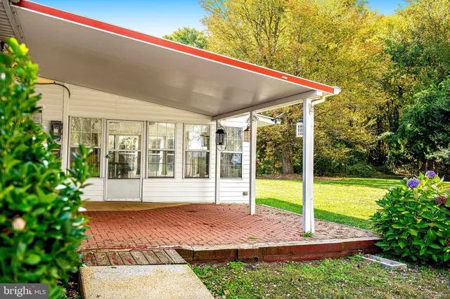 a house view with a garden space