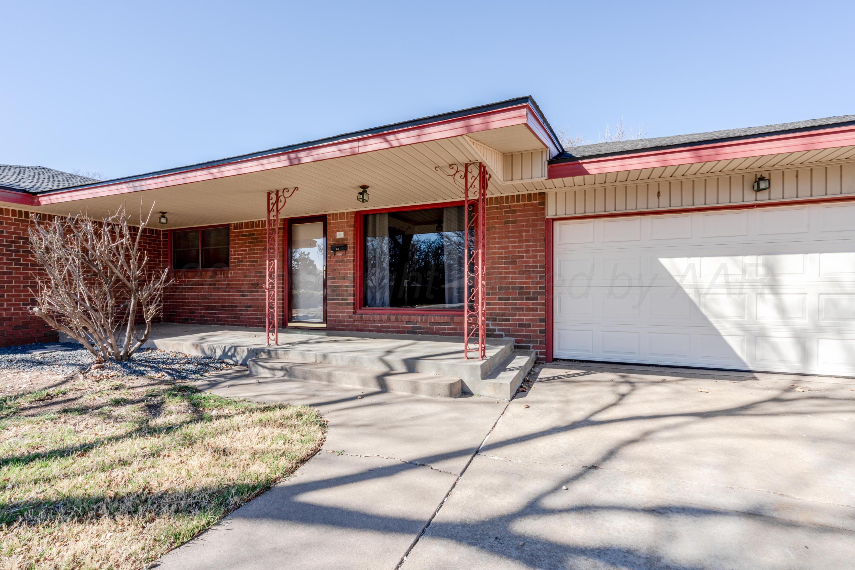 3308 Sunlite Street Amarillo, TX 79106 - Photo 2 of 37 a view of the entrance door of the house