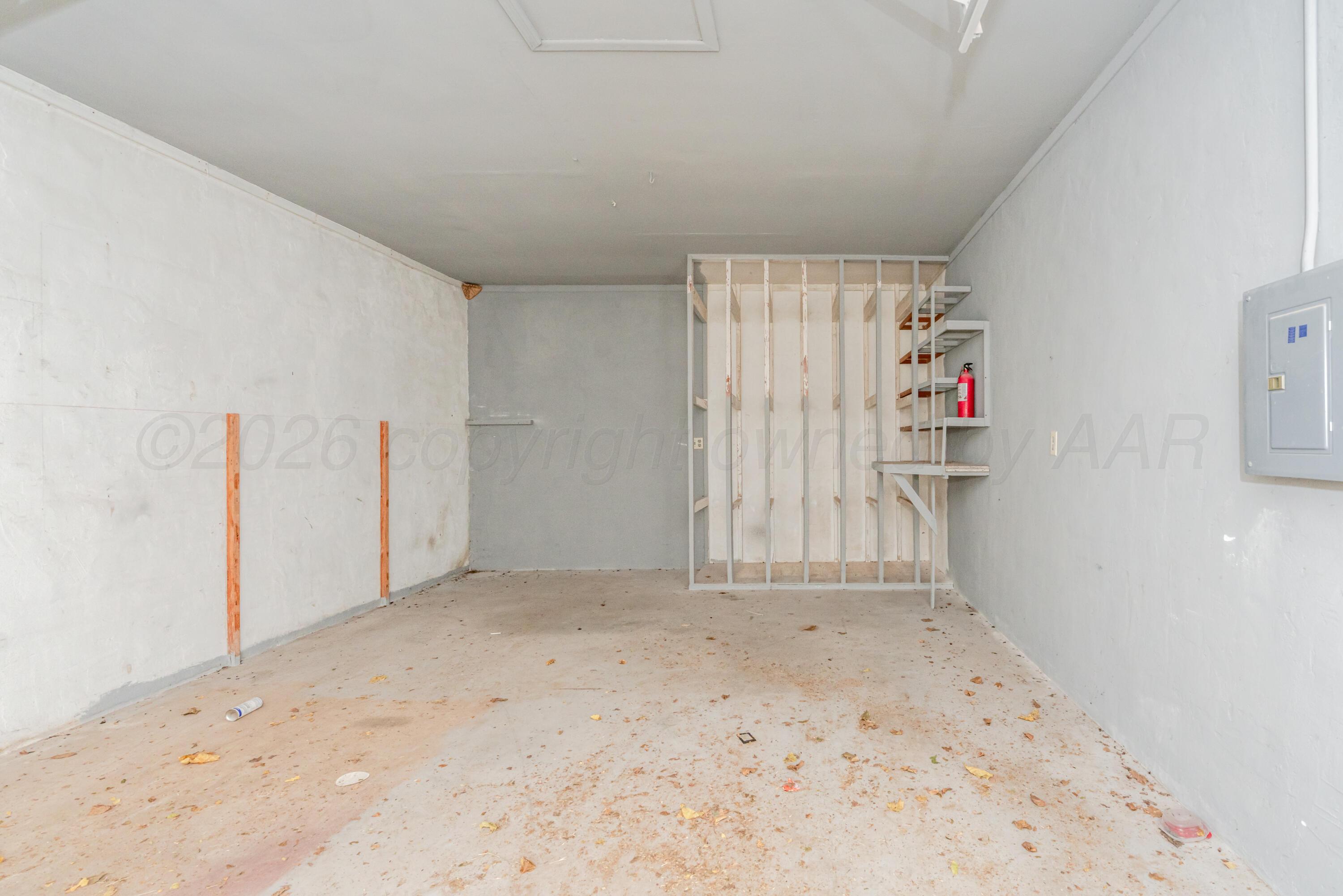 3308 Sunlite Street Amarillo, TX 79106 - Photo 37 of 37 an empty room with cabinet