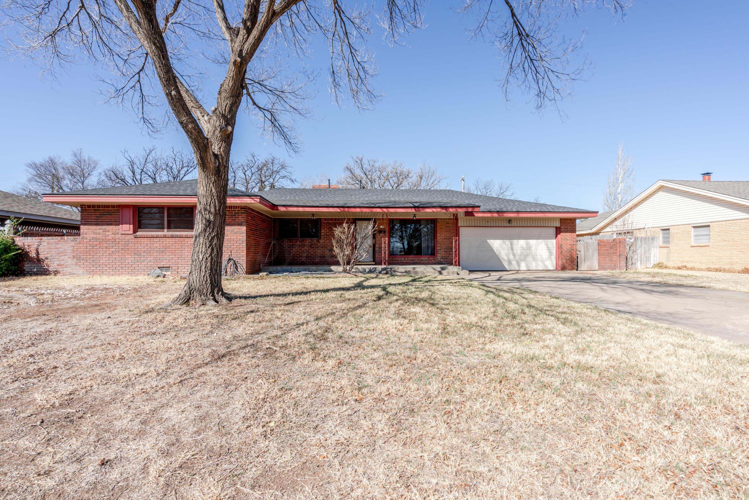 3308 Sunlite Street Amarillo, TX 79106 - Photo 4 of 37 a house view with a backyard space