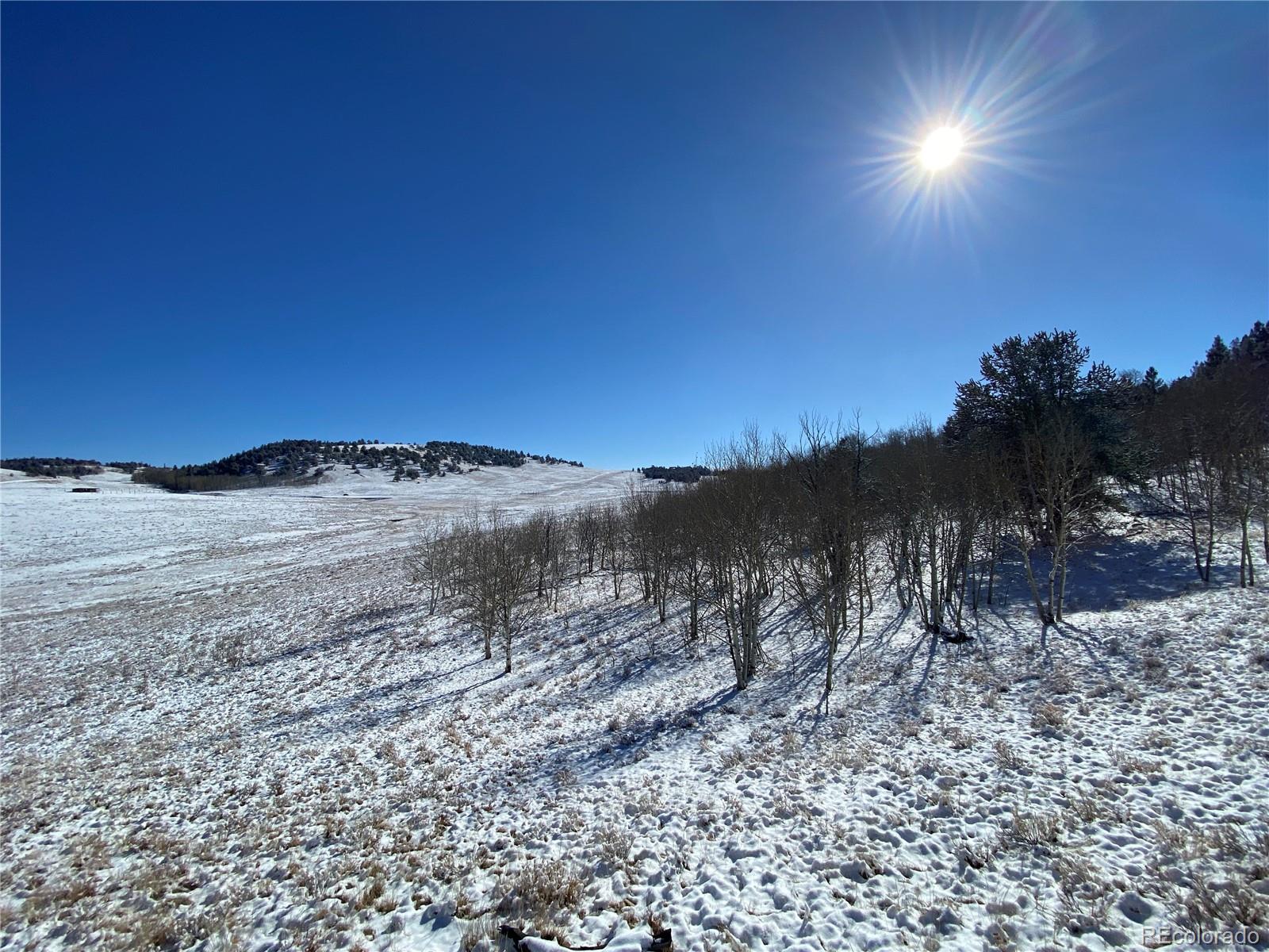 157 Crow Court Como, CO 80432 - Photo 22 of 34 a view of a lake with a mountain