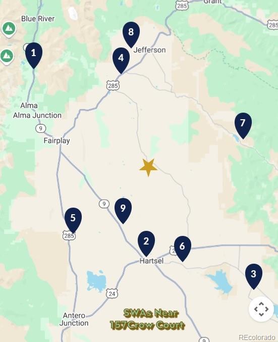 157 Crow Court Como, CO 80432 - Photo 34 of 34 a bathroom with a shower and a mirror