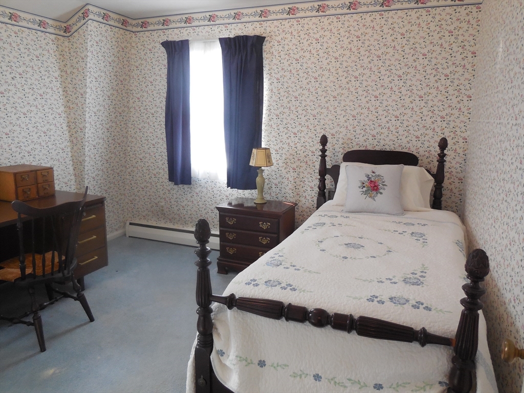 108 West Meadowview Road Holyoke, MA 01040 - Photo 13 of 18 a bedroom with a bed and a desk