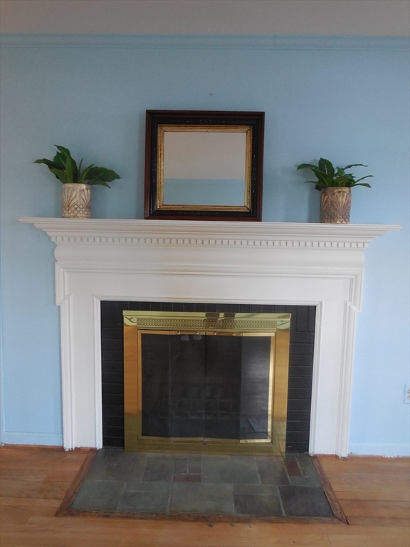 108 West Meadowview Road Holyoke, MA 01040 - Photo 5 of 18 a living room with a fireplace
