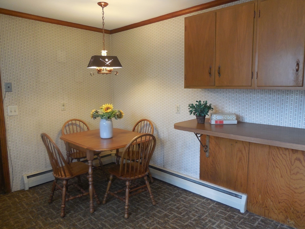 108 West Meadowview Road Holyoke, MA 01040 - Photo 7 of 18 a dining room with furniture and window