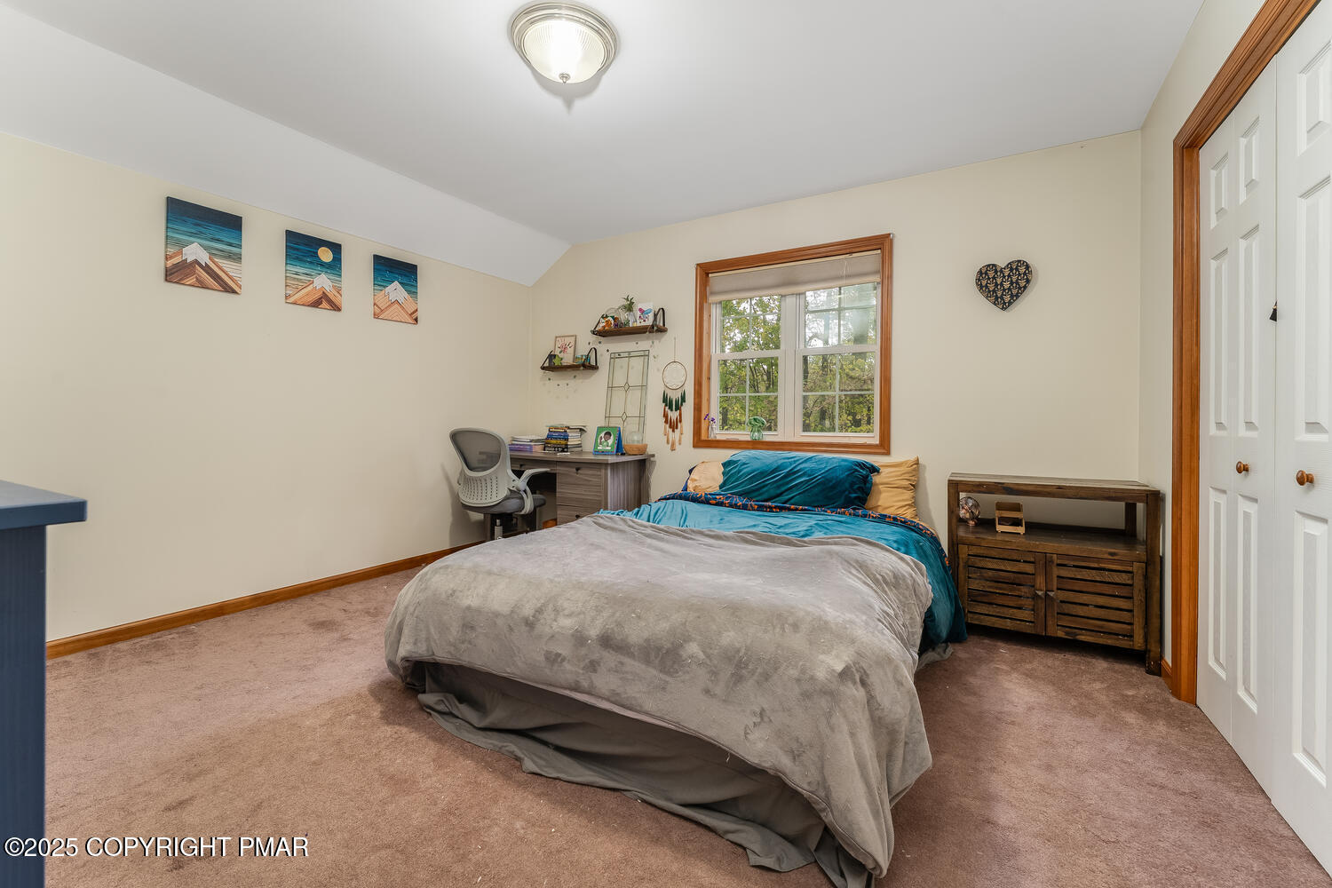 1187 Manzanedo Road East Stroudsburg, PA 18302 - Photo 14 of 31 a spacious bedroom with a bed and wooden floor