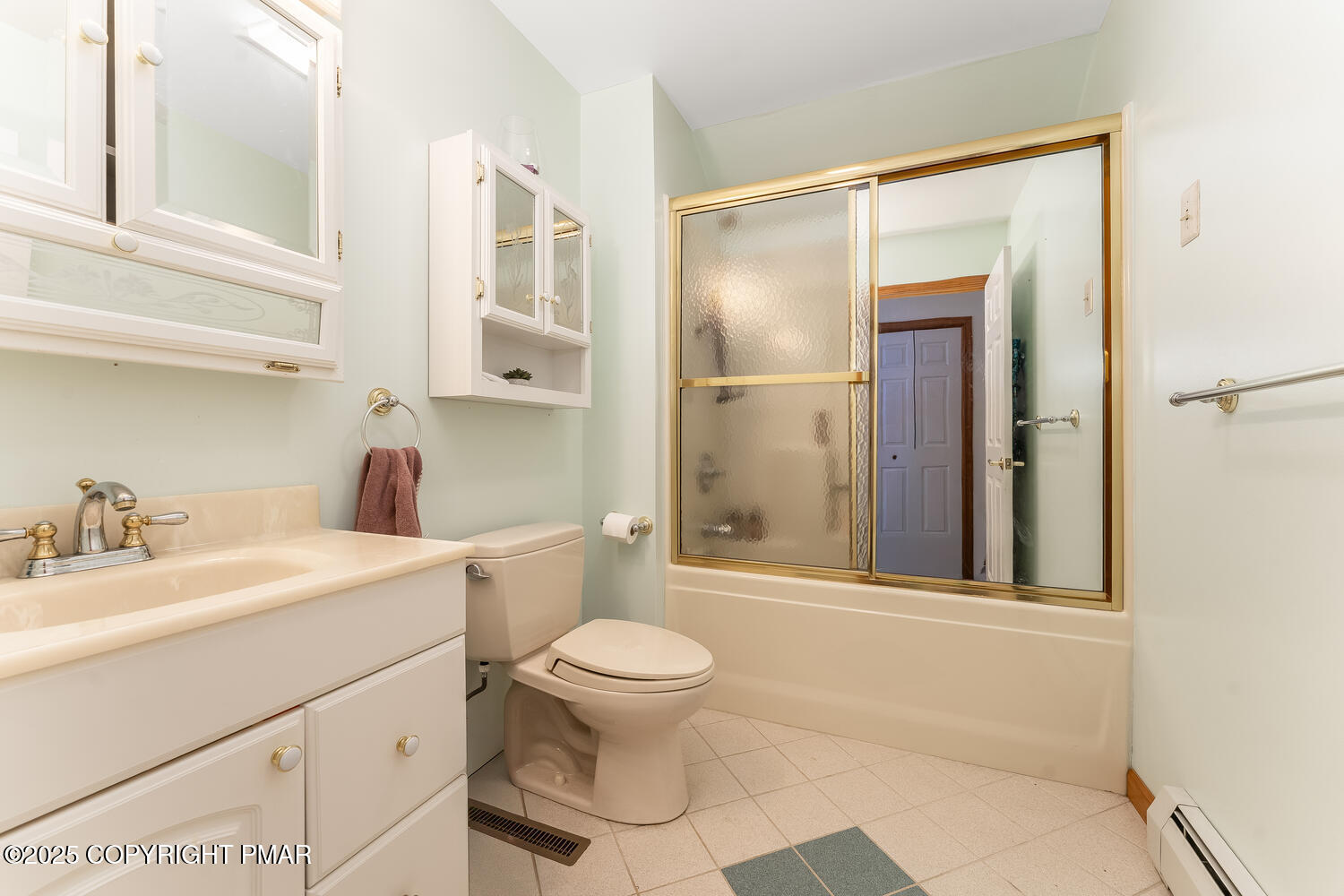 1187 Manzanedo Road East Stroudsburg, PA 18302 - Photo 15 of 31 a bathroom with a sink a toilet and shower