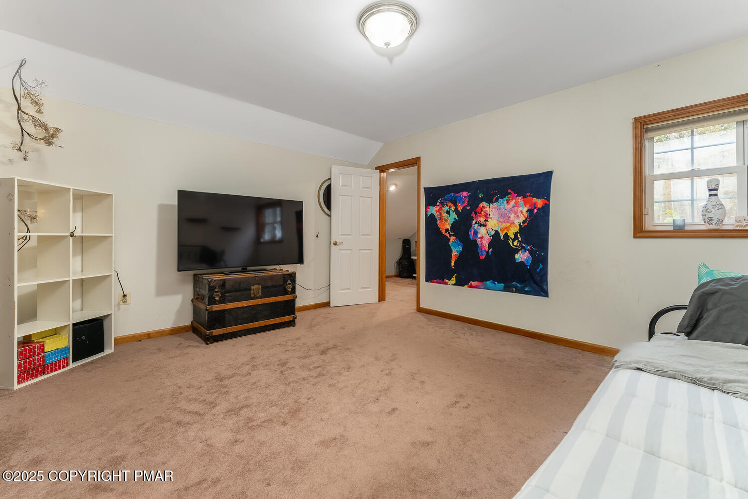 1187 Manzanedo Road East Stroudsburg, PA 18302 - Photo 16 of 31 a living room with furniture and a flat screen tv