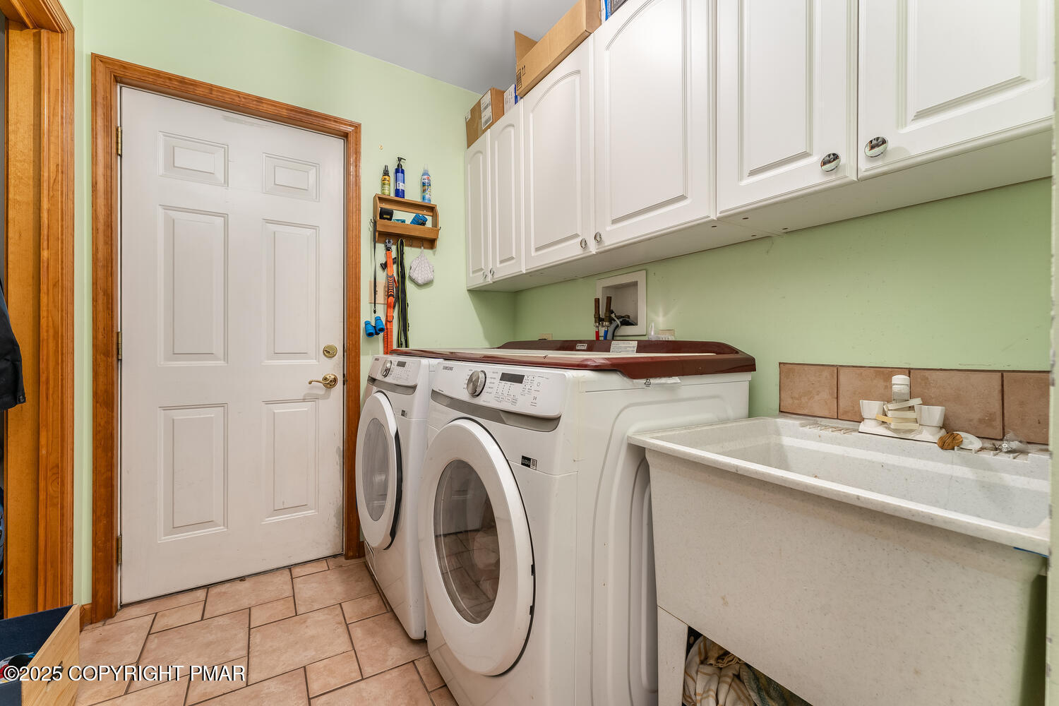 1187 Manzanedo Road East Stroudsburg, PA 18302 - Photo 19 of 31 a utility room with sink dryer and washer