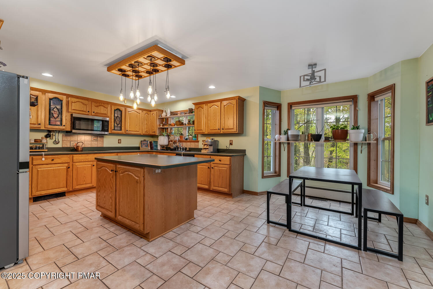 1187 Manzanedo Road East Stroudsburg, PA 18302 - Photo 6 of 31 a kitchen with stainless steel appliances granite countertop a stove top oven a sink dishwasher and cabinets