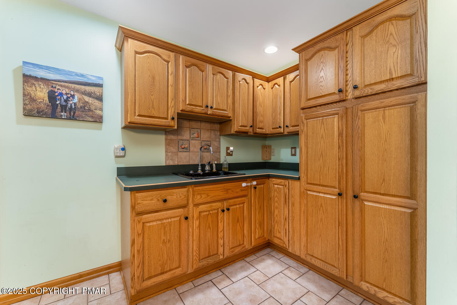1187 Manzanedo Road East Stroudsburg, PA 18302 - Photo 7 of 31 a kitchen with stainless steel appliances granite countertop a refrigerator sink and cabinets